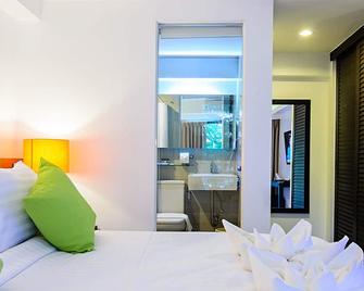 Uma公寓酒店 - 曼谷 - 睡房